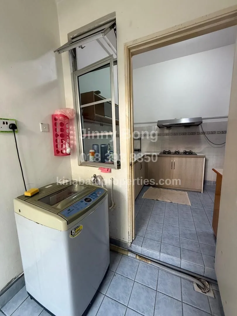 Laundry Area with View of the Dry Kitchen