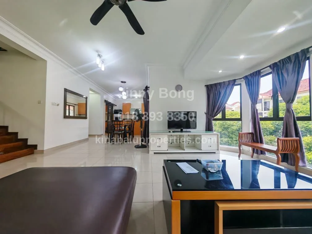 Living room with dining area in the background